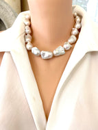 Baroque Pearl Chunky Necklace showcasing handcrafted design with unique white freshwater baroque pearls on a soft grey silk thread.
