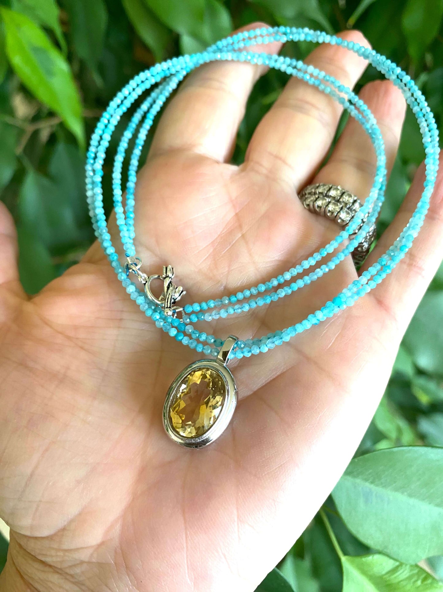 Blue Amazonite Citrine Pendant Necklace featuring blue amazonite beaded strands and a yellow citrine gemstone pendant.