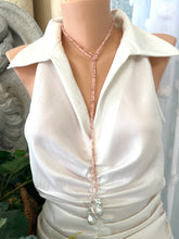 Charger l&#39;image dans la galerie, Pink Opal Baroque Pearl Necklace displayed on mannequin, showcasing its lariat design and elegant pink opal beads.
