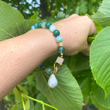 Load image into Gallery viewer, Sardonyx baroque pearl bracelet worn on wrist showing green beads and pearl charm
