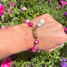 Load image into Gallery viewer, Sardonyx baroque pearl bracelet with hot pink beads styled outdoors on wrist
