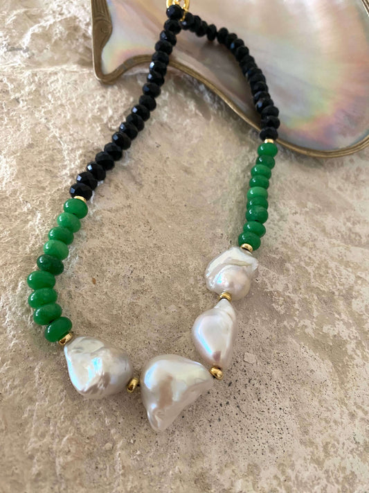 Short green jade black tourmaline pearl necklace featuring vibrant jade, black tourmaline, and luminous baroque pearls.