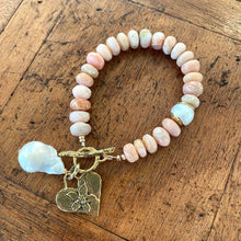 Load image into Gallery viewer, Pink opal bracelet with heart and baroque pearl charm showcasing artisan craftsmanship and natural beauty.
