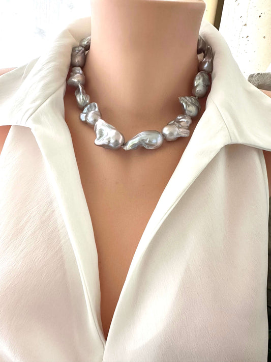 Baroque pearl necklace with silver details displayed on a mannequin, handcrafted in Canada.