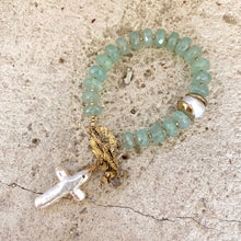 Load image into Gallery viewer, Chalcedony bracelet with cross pearl pendant and daisy charm, handcrafted with aqua green chalcedony rondelle beads.
