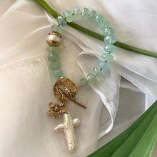 Load image into Gallery viewer, Chalcedony bracelet with cross pearl pendant and daisy charm, featuring aqua green chalcedony rondelle beads.
