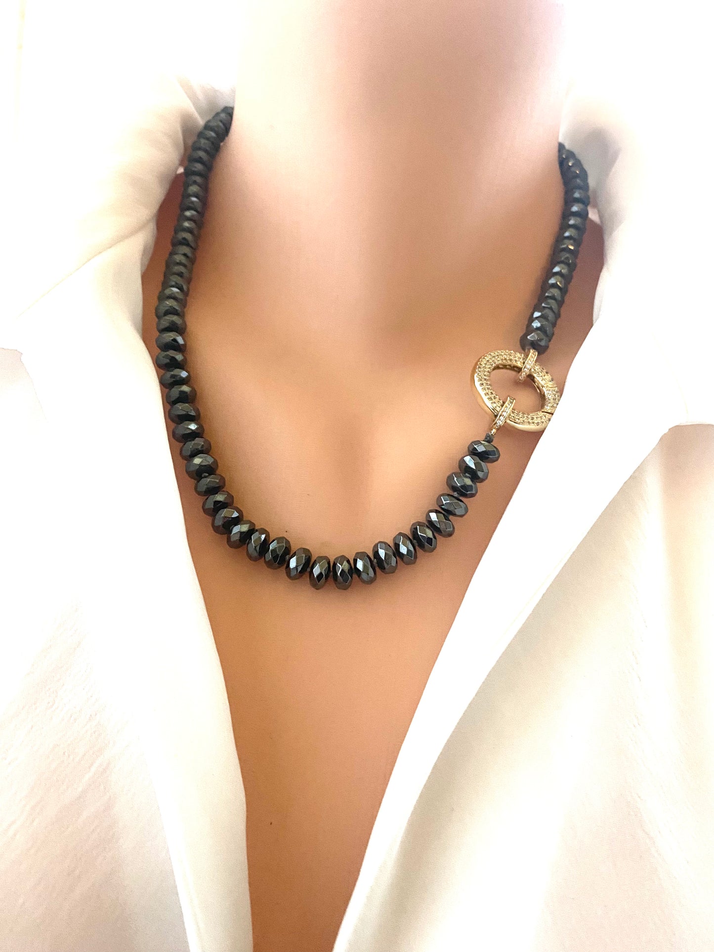 Festive Hematite Necklace displayed on a model, showcasing its elegant design and shiny hematite beads.