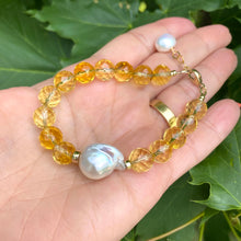 Load image into Gallery viewer, Citrine pearl bracelet featuring AAA-quality faceted citrine beads and a baroque pearl in handcrafted design.
