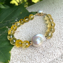 Load image into Gallery viewer, Citrine pearl bracelet featuring luminous citrine beads and a stunning baroque pearl centerpiece.
