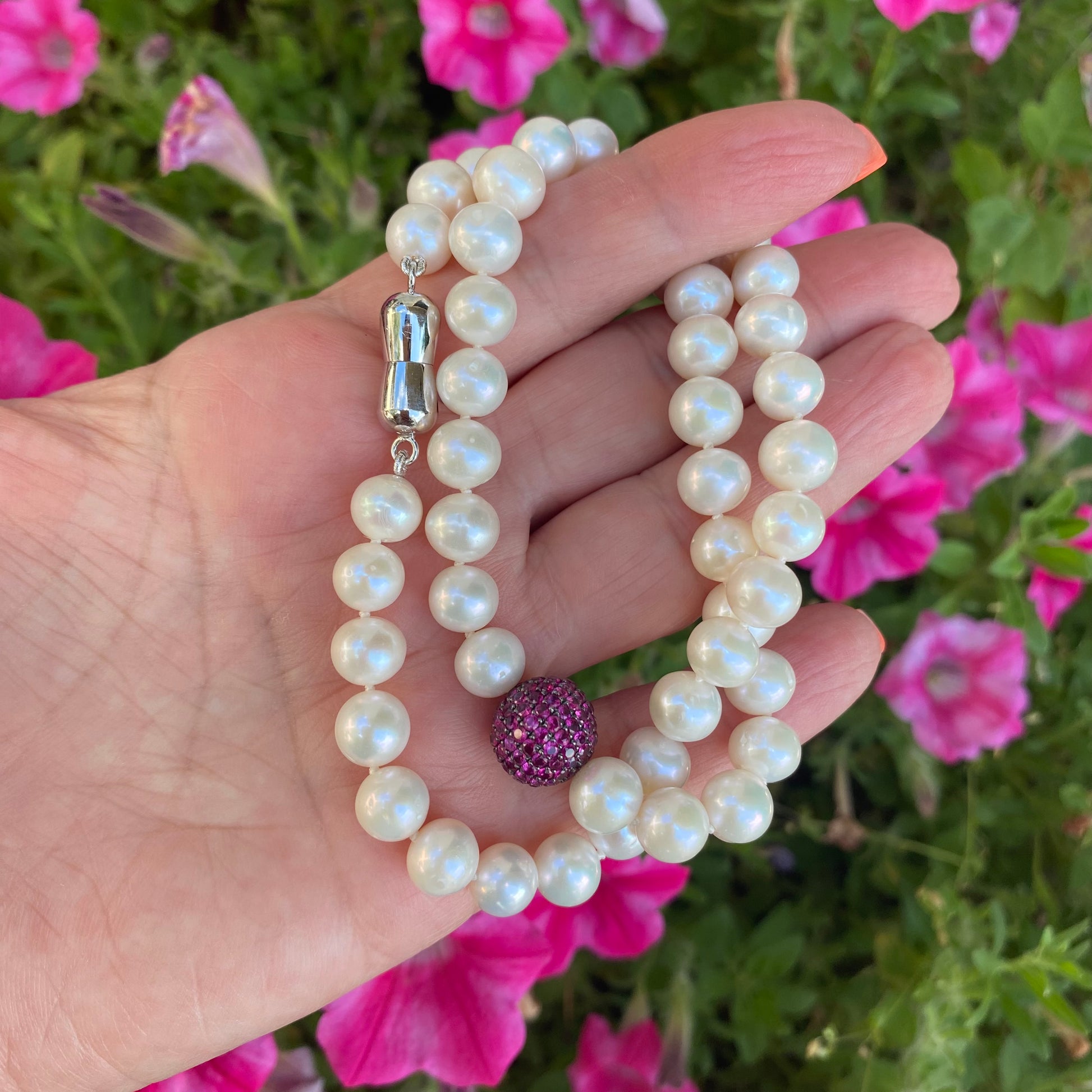 Handmade pearl necklace featuring ruby red CZ bead, perfect for special occasions and crafted with care in Canada.