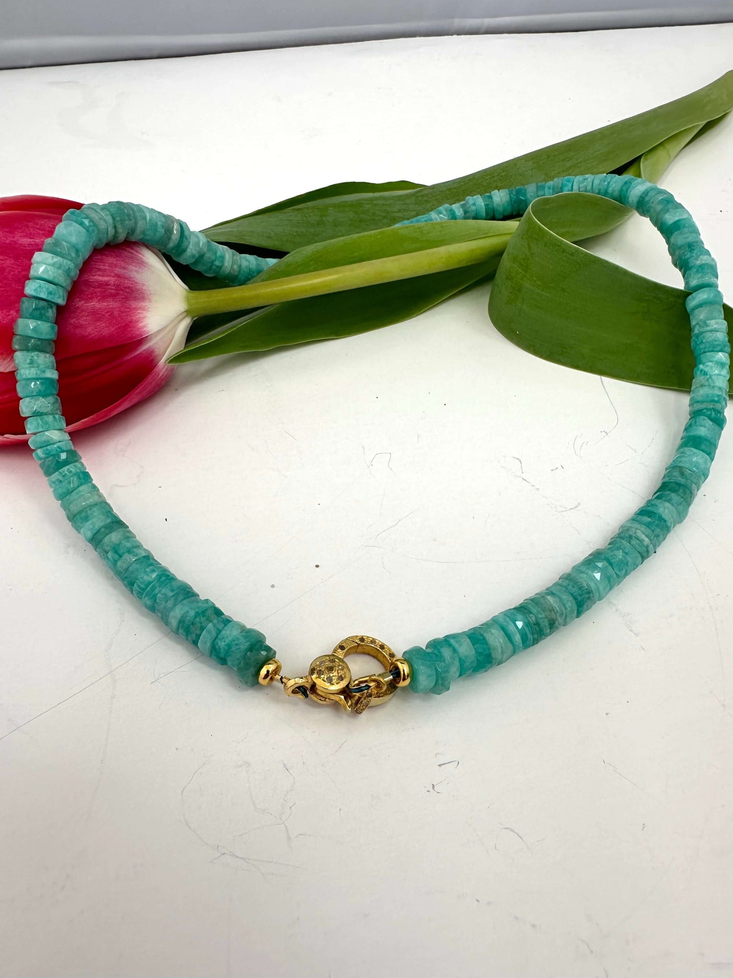 Blue amazonite gemstone necklace with diamond pavé gold vermeil clasp, showcasing unique ocean-blue beads.