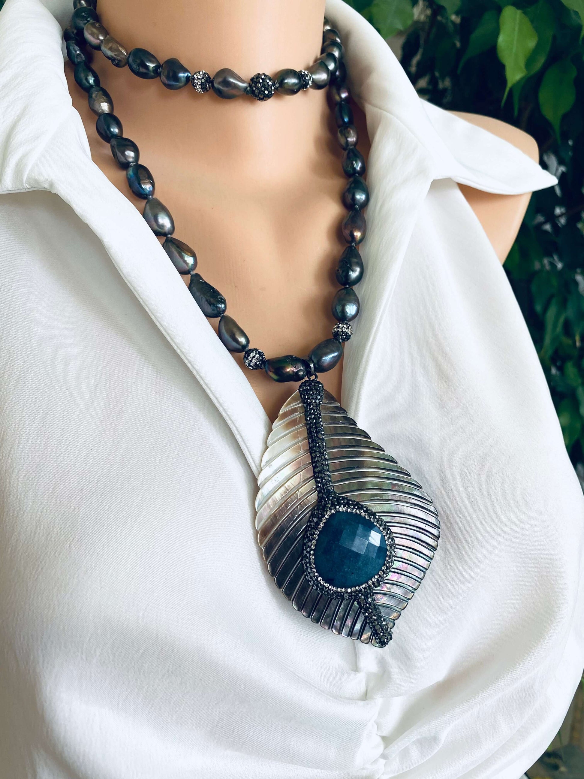 LIVE #80 - Long Peacock Black Pearl Necklace w/ Abalone Agate Pendant showcased on mannequin, highlighting its unique design and colors.