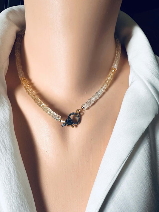 Shaded citrine gemstone necklace with diamond pavé gold vermeil clasp displayed on mannequin.