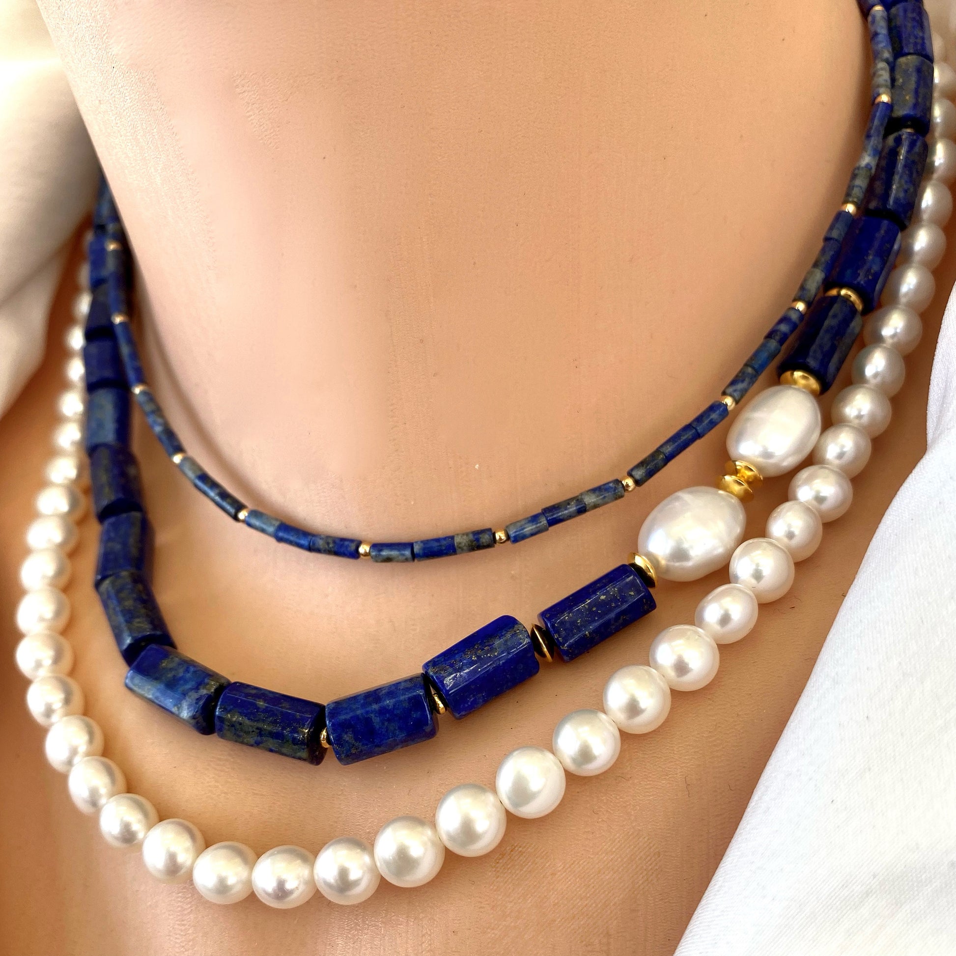 Lapis lazuli onyx choker necklace styled layered with pearl necklace for contrast