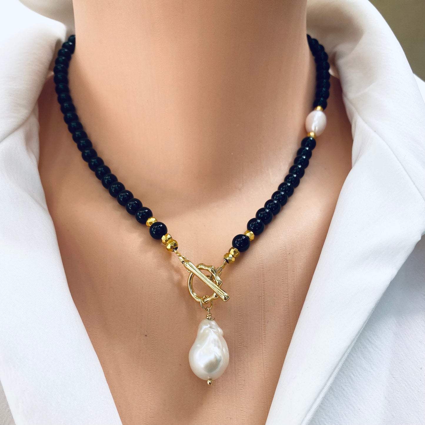 18"-21"inches long Black Onyx Necklace and Baroque Pearl pendant