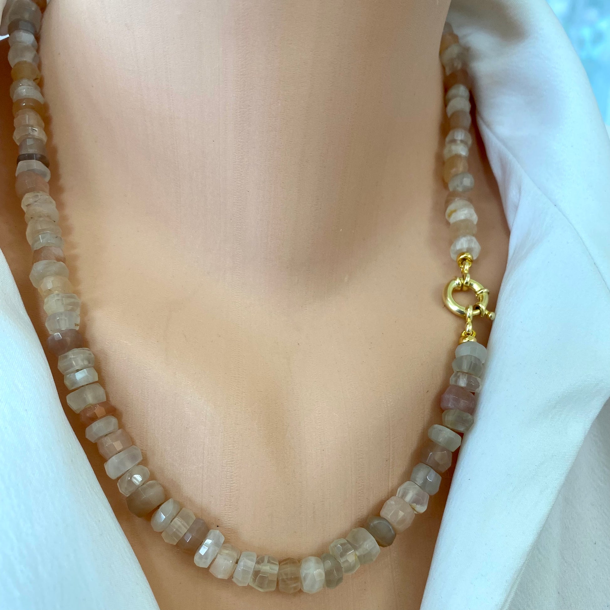 Moonstone candy necklace worn as a statement piece with mixed moonstone beads
