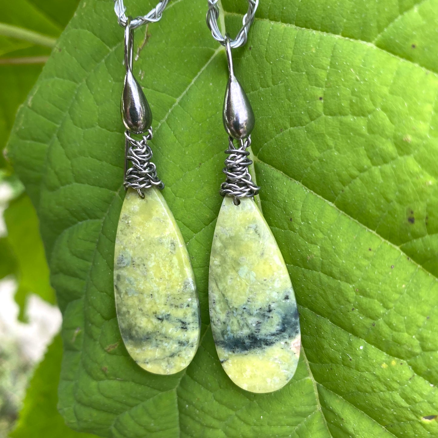 Green serpentine teardrop earrings in black rhodium, handmade in Canada