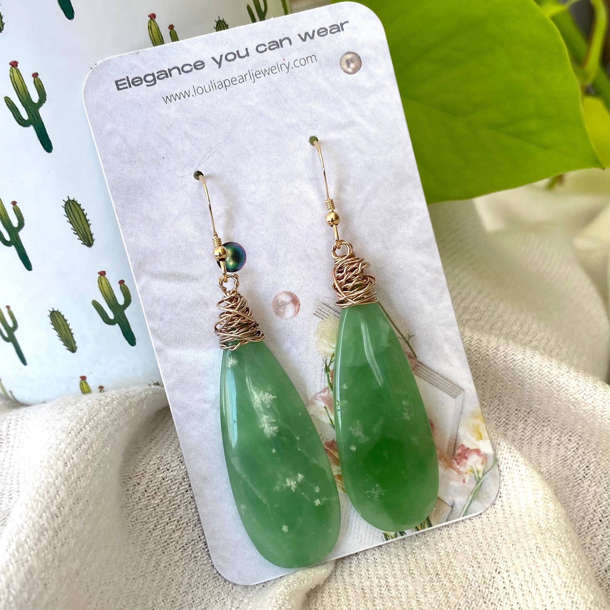 Teardrop green onyx earrings on display card with gold filled hooks
