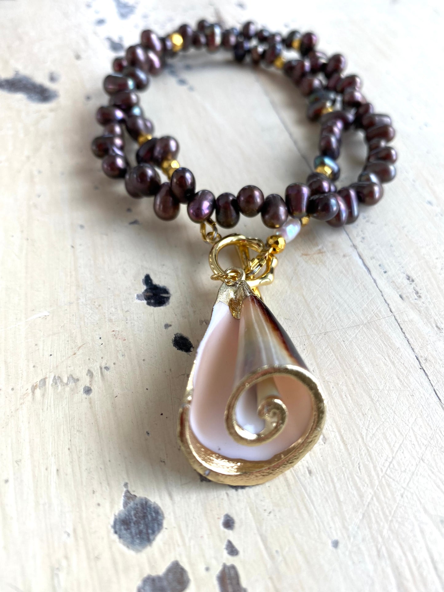 Brown pearl seashell necklace with gold plated toggle clasp and natural seashell pendant
