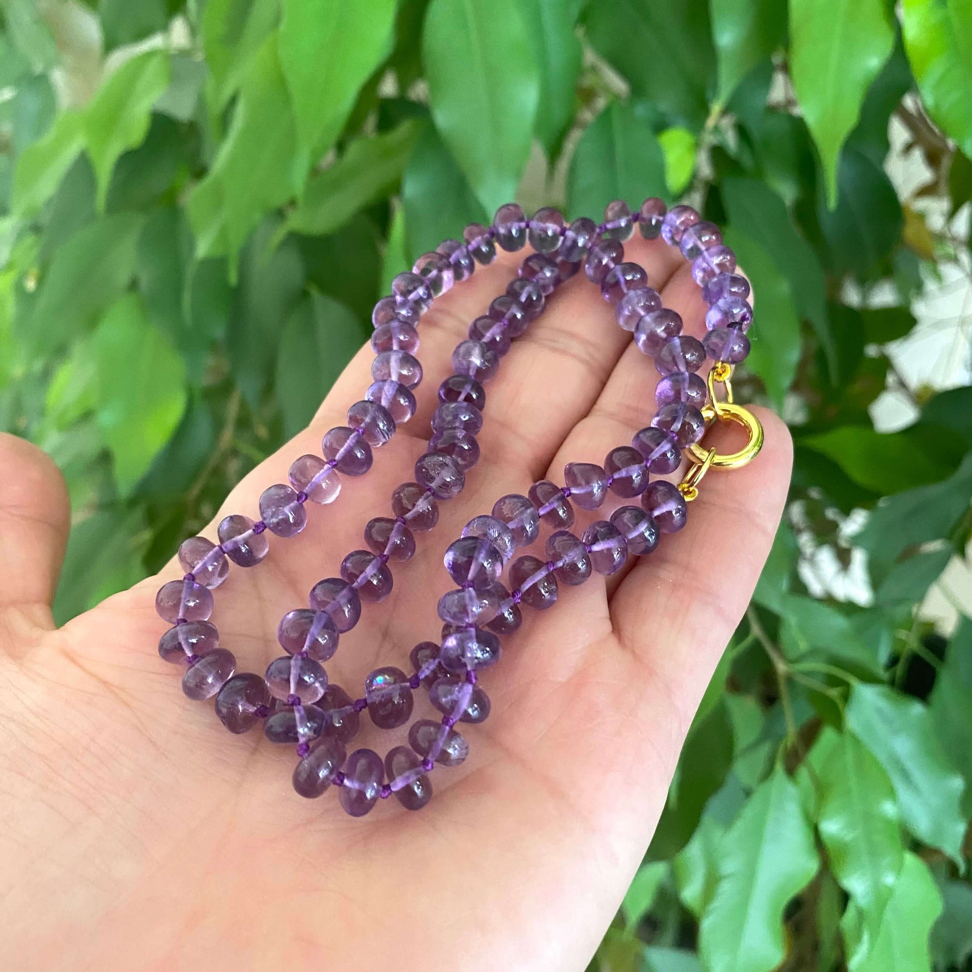 Amethyst candy necklace featuring natural Brazilian amethyst beads in rich purple tones, handcrafted and elegant.