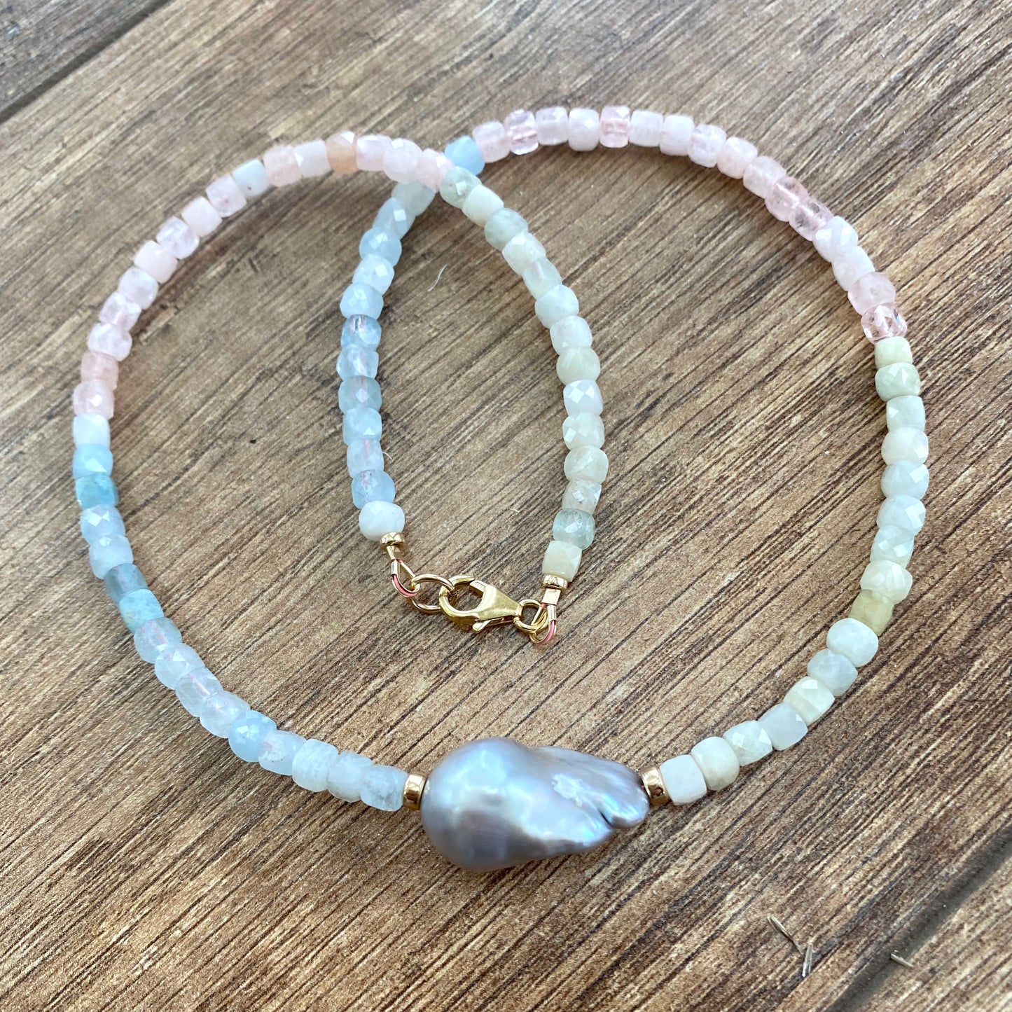 Aquamarine morganite pearl necklace featuring faceted gemstone beads and gold filled clasp