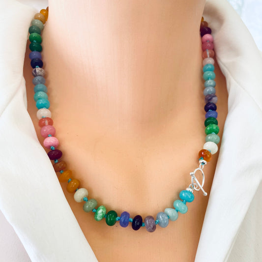 Rainbow candy necklace with vibrant gemstone beads and silver clasp displayed on a mannequin.