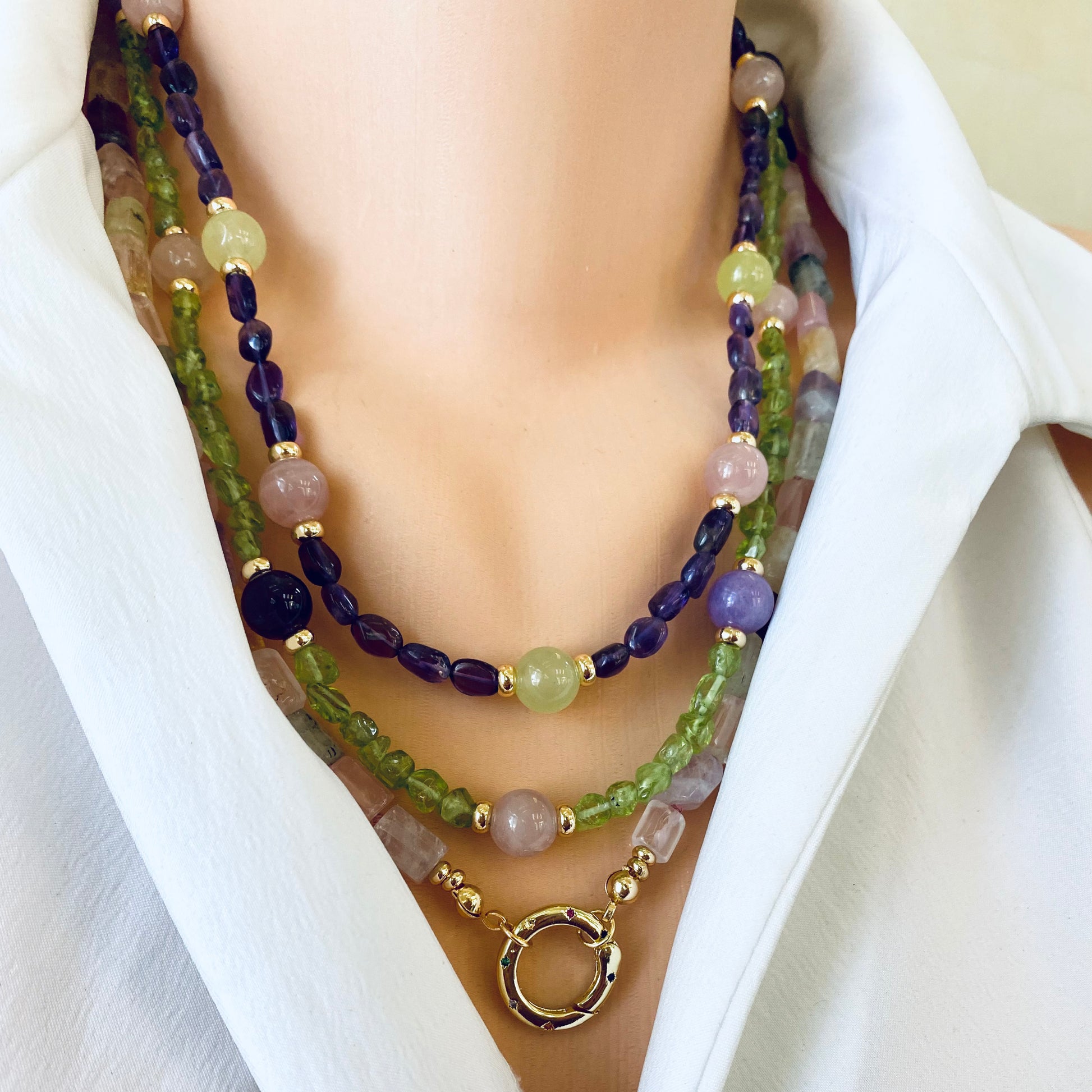 Layered mixed gemstone necklace styling with gold plated charm holder clasp, handmade Canadian statement jewelry