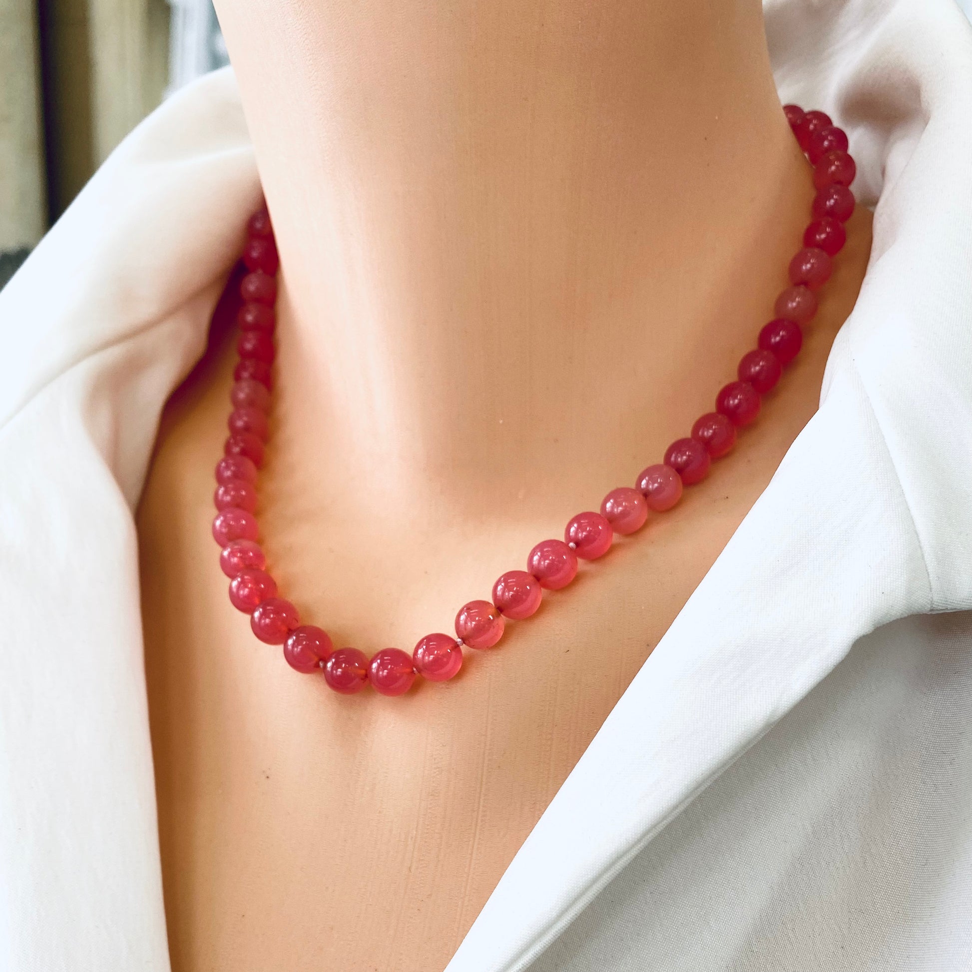 Strawberry quartz cherry necklace worn on neck, handmade candy gemstone jewelry from Canada