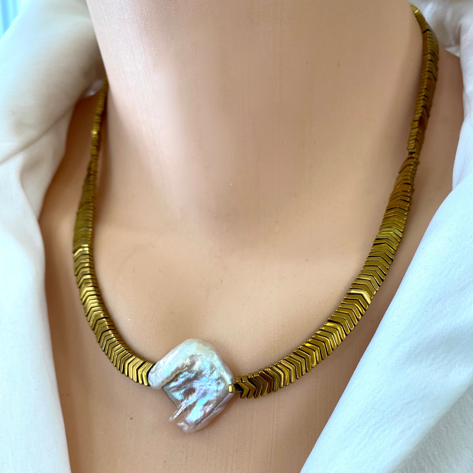 Gold hematite keshi pearl necklace detailed view of gold hematite beads and organic pearl shape