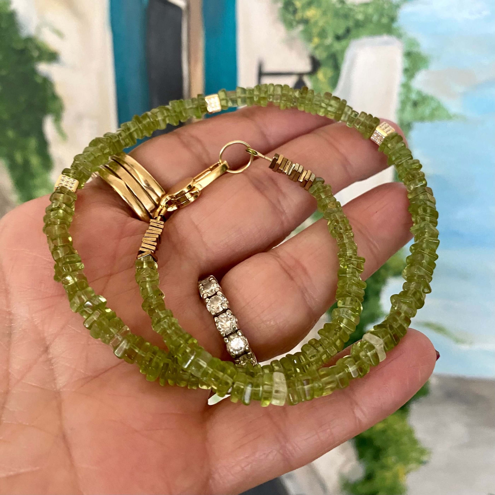 Peridot choker necklace featuring natural green peridot beads, showcasing vibrant lime-green hues in a handcrafted design.